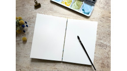 Carnet d'aquarelle A5 portrait - Papier Arches - Japonais Fleurs de cerisier sur jaune | L'atelier Reliure