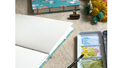 Carnet d’aquarelle A5 portrait ou paysage – Papier Arches - Couverture en papier japonais floral turquoise | L'atelier Reliure