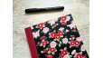 Carnet de notes A5 Tsubaki en papier japonais rouge et noir – collection Yūwa – reliure artisanale L’Atelier Reliure.