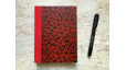 Carnet de notes moyen Momiji en papier japonais rouge et noir – collection Yūwa – reliure artisanale de L’Atelier Reliure.