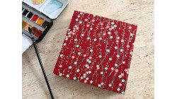 Carnet d’aquarelle carré – couverture en papier japonais Branches en fleurs rouge | L’atelier Reliure