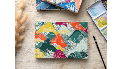 Carnet d’aquarelle découverte 5 papiers - Couverture papier japonais montagnes rivières | L’atelier Reliure