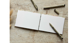 Carnet de croquis A6 fait main — Reliure copte, papier japonais | L'Atelier Reliure