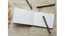 Carnet de croquis A6 fait main — Reliure copte, papier japonais | L'Atelier Reliure