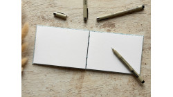 Carnet de croquis A6 fait main — Reliure copte, papier japonais | L'Atelier Reliure