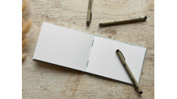 Carnet de croquis A6 fait main — Reliure copte, papier japonais | L'Atelier Reliure