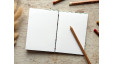 Carnet de croquis A6 fait main — Reliure copte, papier japonais | L'Atelier Reliure