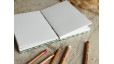 Carnet de croquis A6 fait main — Reliure copte, papier japonais | L'Atelier Reliure