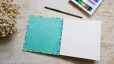 Carnet d’aquarelle carré 15 × 15 cm - Papier Khadi - Couverture papier japonais Camélias vert bleu| L'atelier Reliure