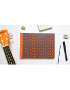 Carnet de partition musicale fait main — Portées vierges, reliure à plat | L'Atelier Reliure